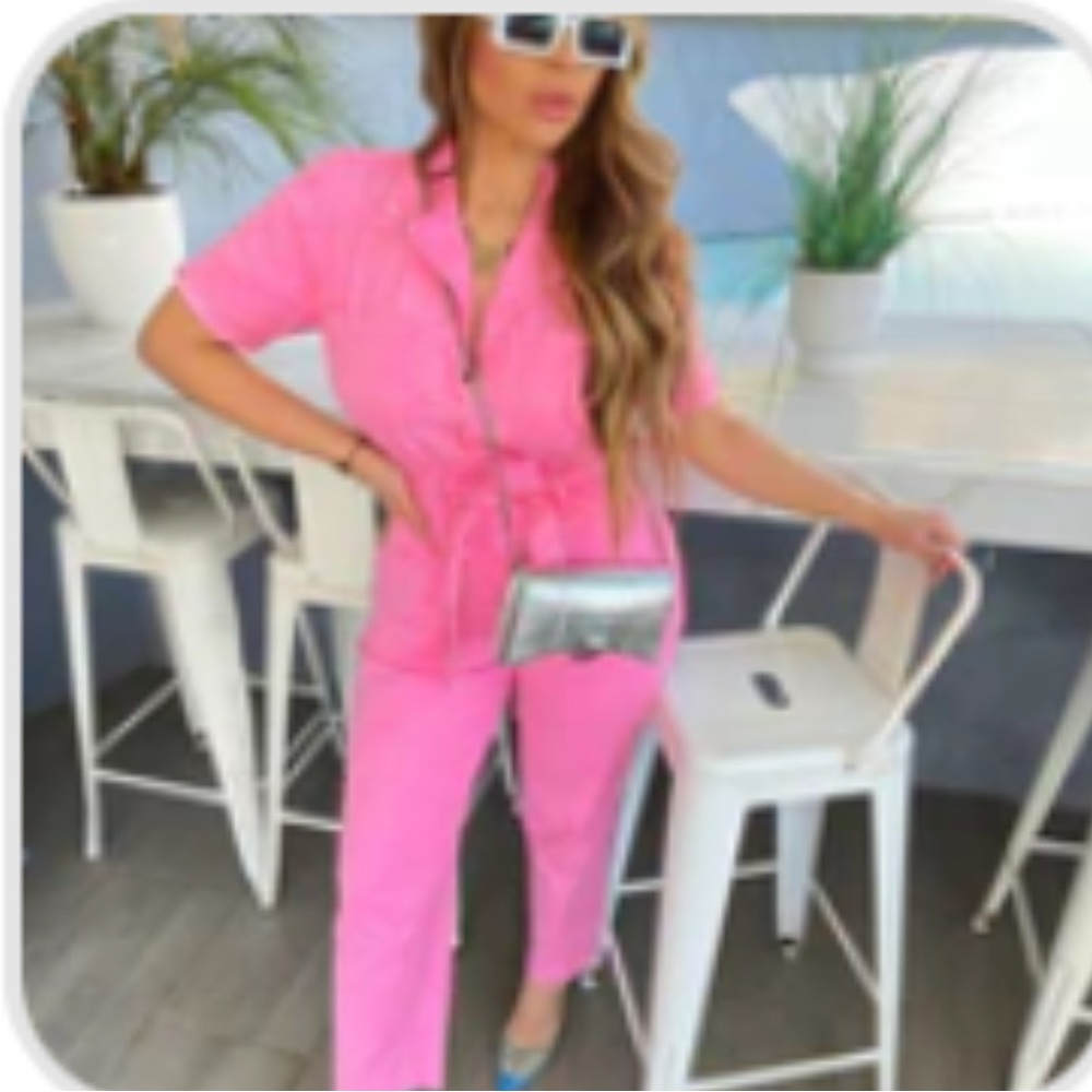 Chic Pink Jumpsuit with Silver Bag